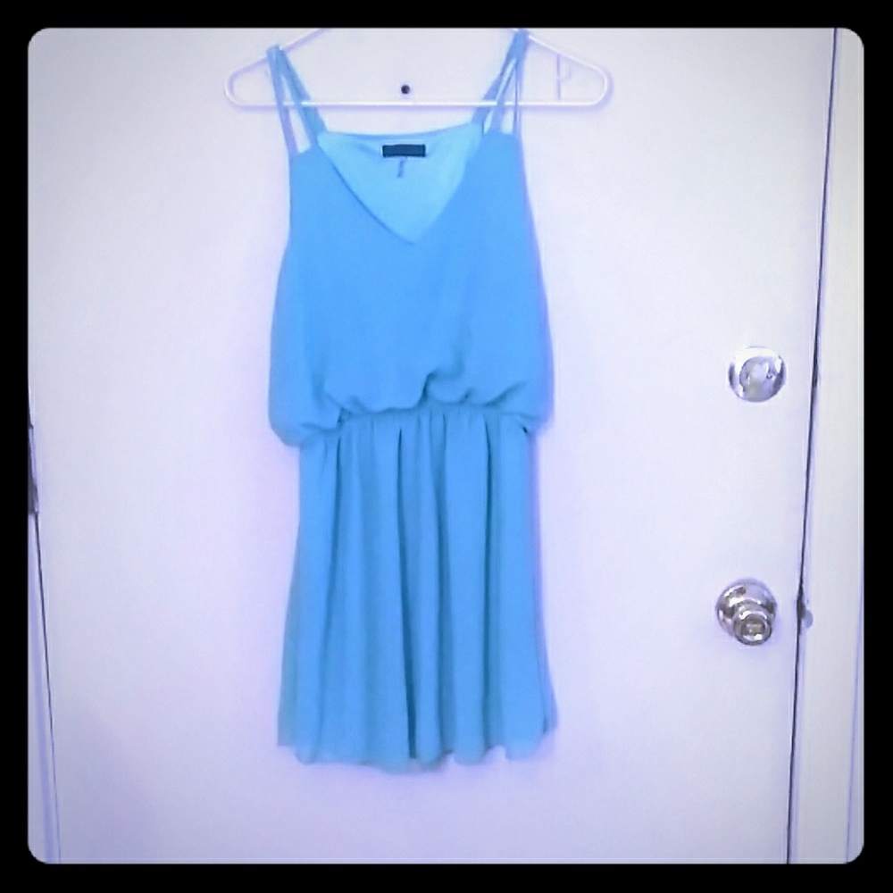 Turquoise women's dress (s)